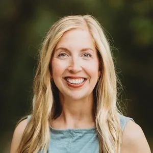 Dr. Lauren Neitzke, DDS, of Tonka Smiles, smiling outdoors.